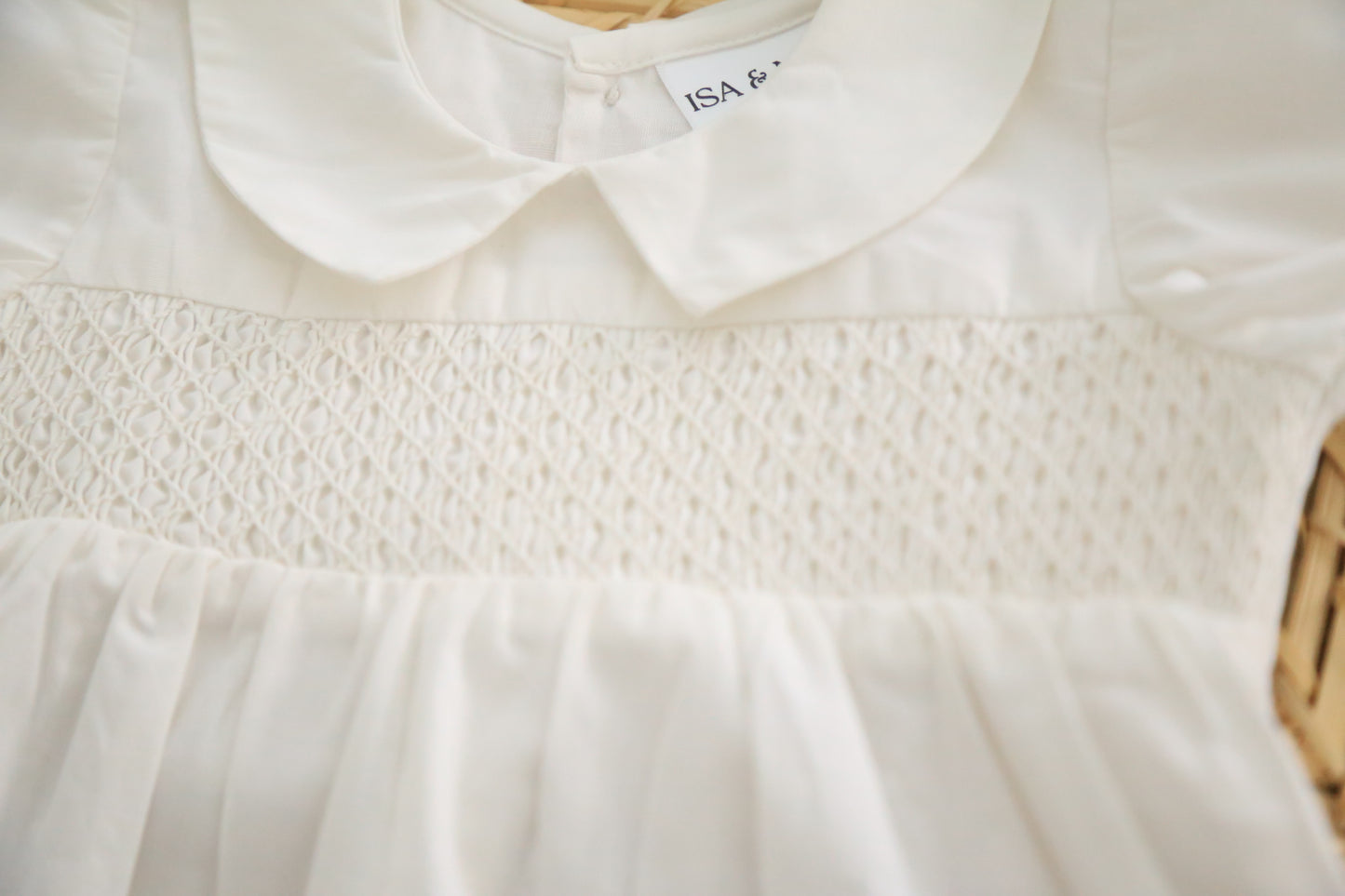 Hand-smocked baby boy white romper
