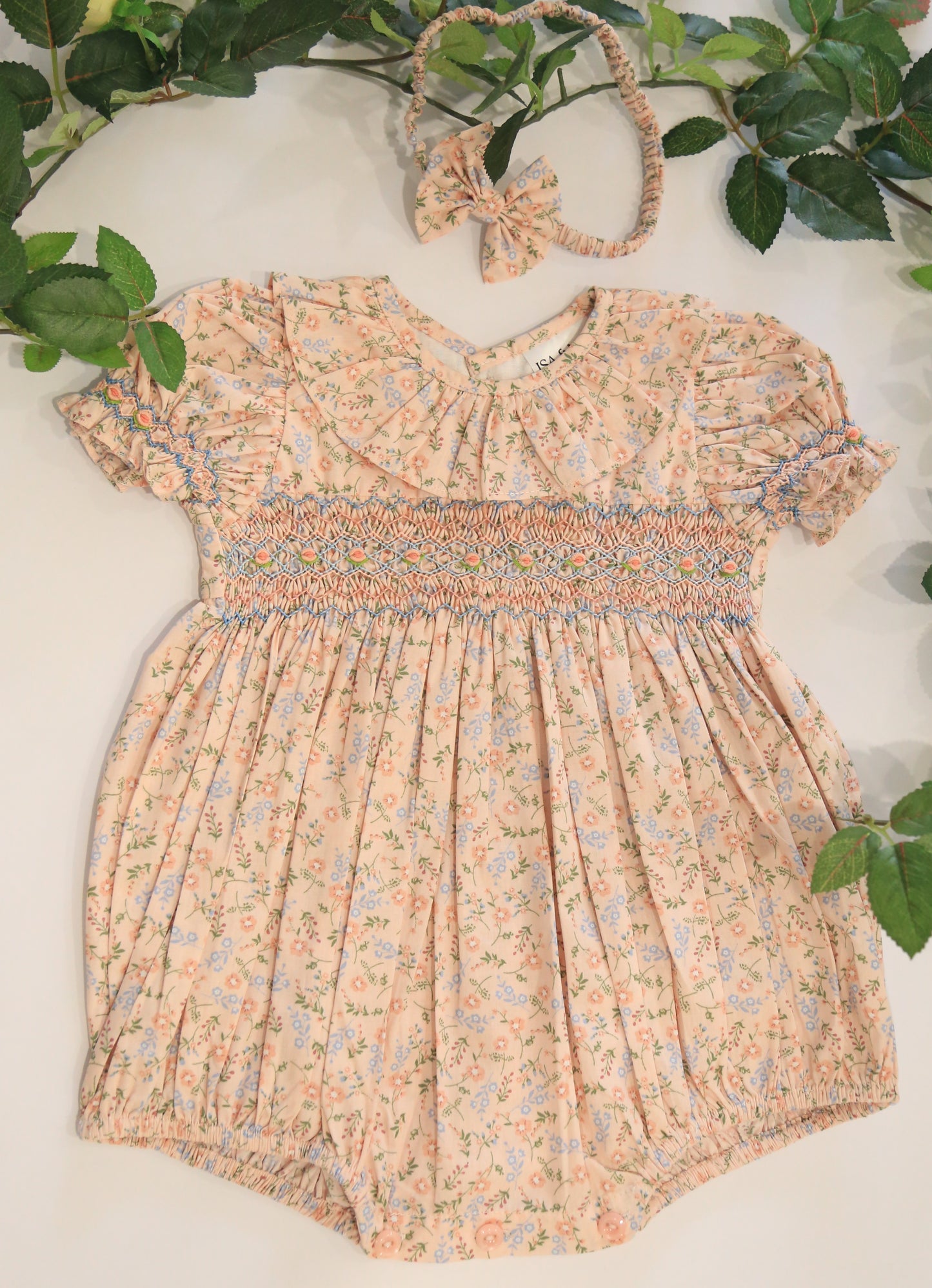 Pink Floral Baby hand smocked romper