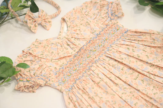 Pink Floral Baby hand smocked romper