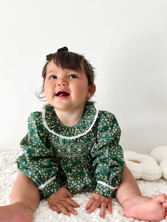 Green hand smocked long sleeve romper
