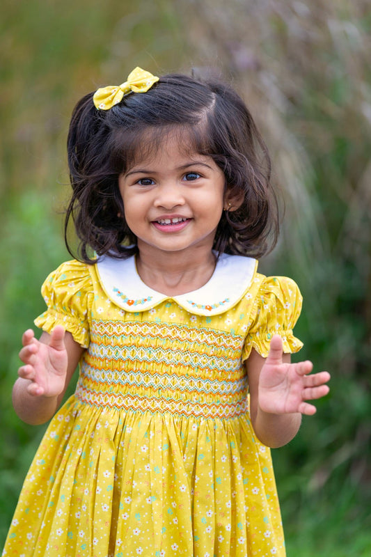 Yellow Floral hand smocked dress